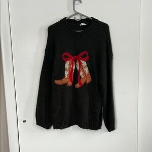 Black Sweater with Red Boot Design